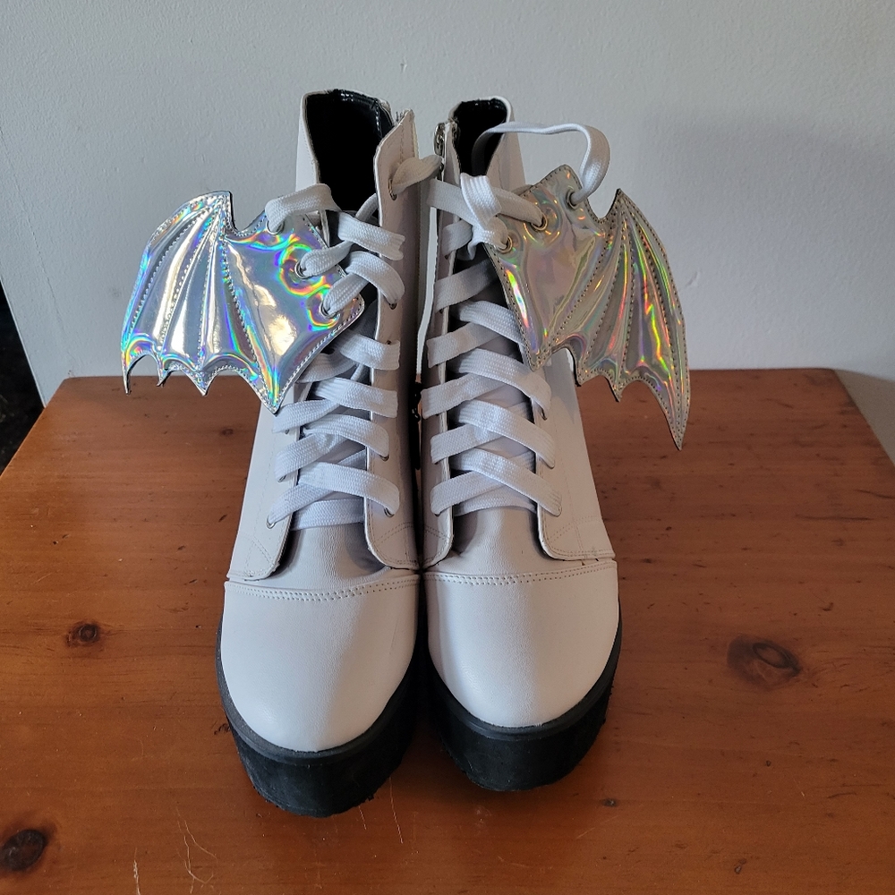 Iron First holographic bat wing platforms